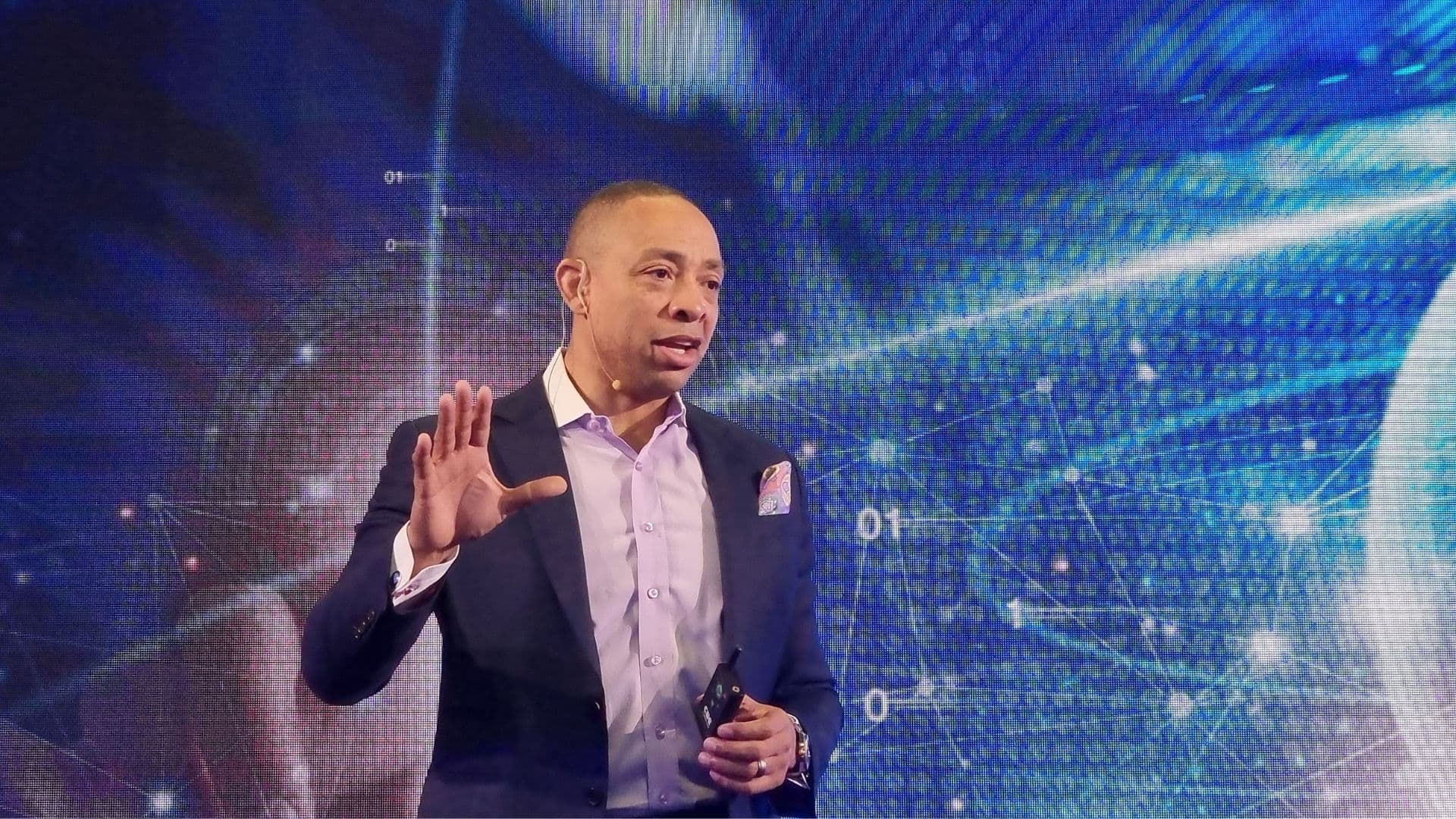 Joseph Bradley speaking on stage